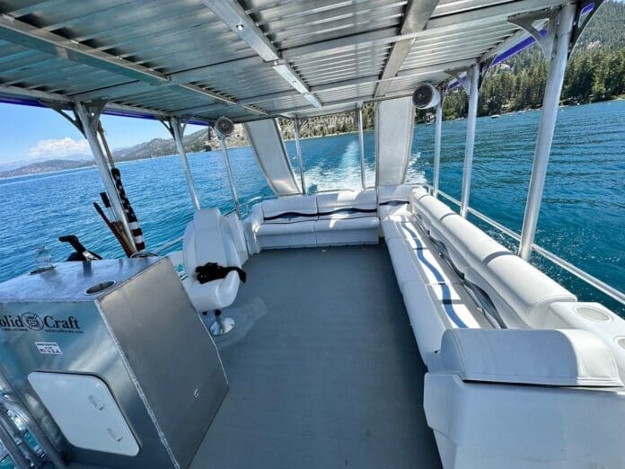 Double decker pontoon boat on Lake Tahoe. View of the spacious seating interior