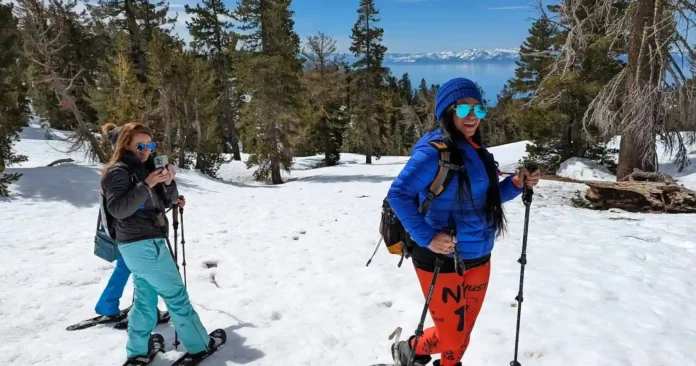 Chickadee-Ridge-Half-Day-Hike-1 Group of friends on a snowshoe hike above Lake Tahoe with views of the lake in the background