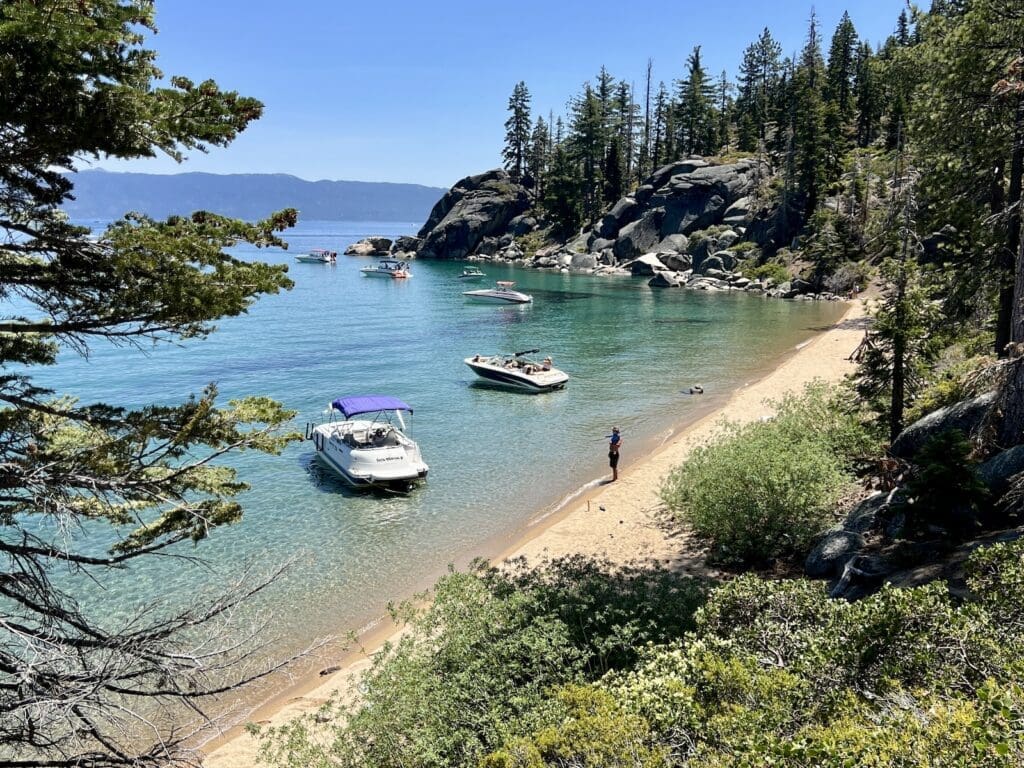 Calawee Cove beach at DL Bliss State Park with boats in the water on a summer day