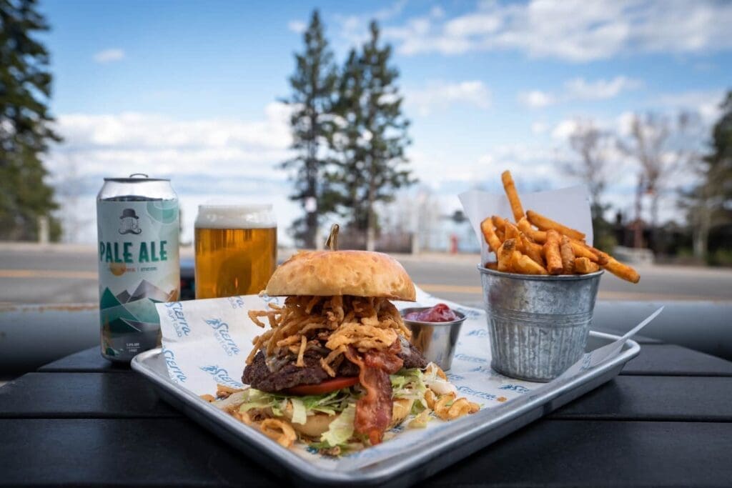 Burger, fries and a beer on the outdoor patio at Sierra Surf Club in Tahoe City