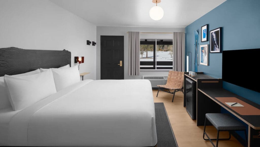 Interior king bedroom at evo hotel tahoe city
